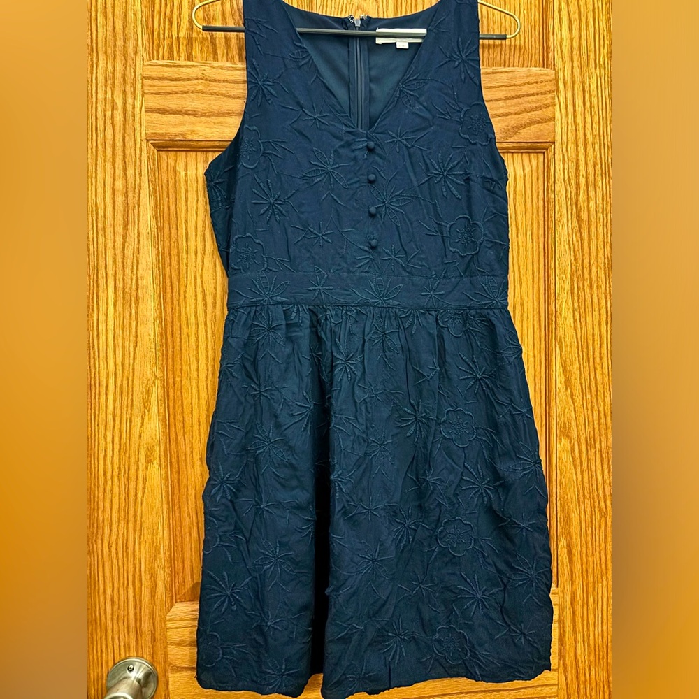 Loft size 4 embroidered a line dress in navy. Lined w/pockets & button accents